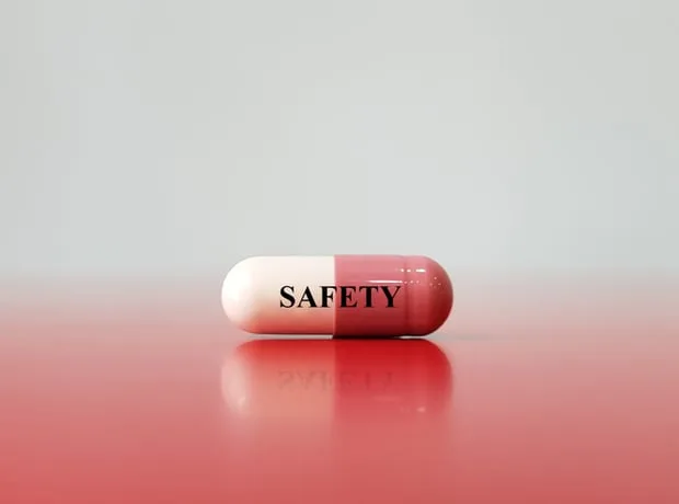 Pill with Safety text illustrating drug safety concept.